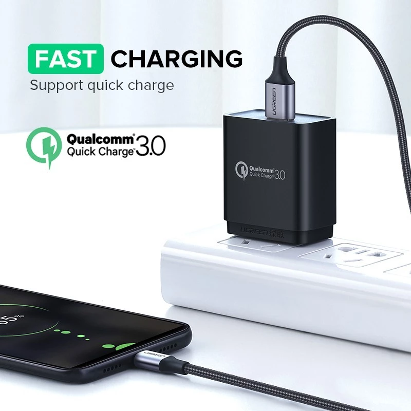 Micro USB cable charging a phone